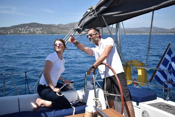 Captain and hostess sailing Sporades